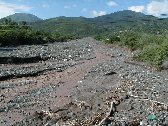 DEBRIS FLOODS: Following the 25-29 October 2002 rainfall, the Chalky River channel in South Eastern St. Andrew was choked by debris.