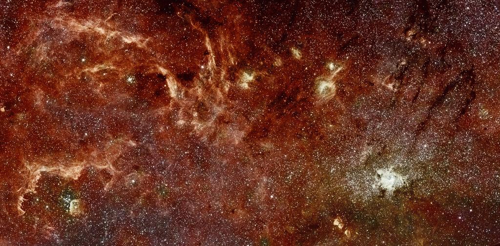The Galactic Center as seen by SPITZER and HUBBLE arched filaments Arches Quintuplet SgrA west 300 x 115 light years = 91 x 34.