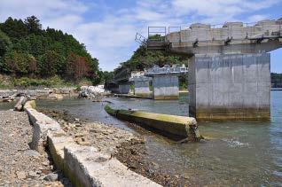Photo 4 shows a road bridge on National Highway 45 located on a coastal site in Utatsu district, Minamisanriku Town.