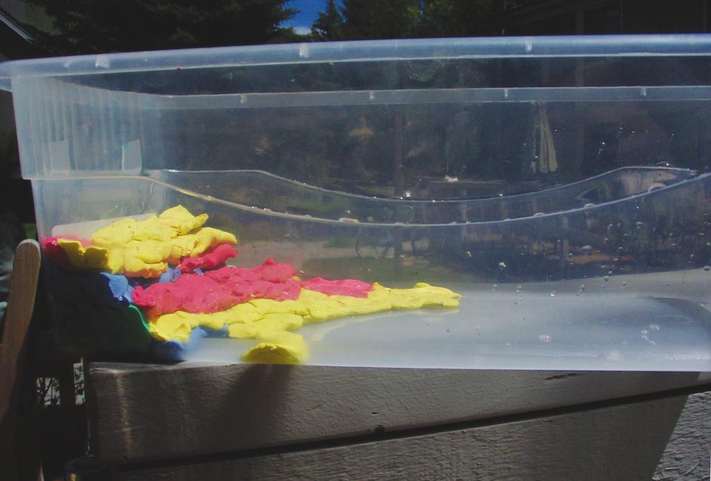 Part 2: Build the model coastline and seafloor 1. Place the bathymetric map under the clear container so that you can see the contour lines. Line the map up with the edges of the shoebox.