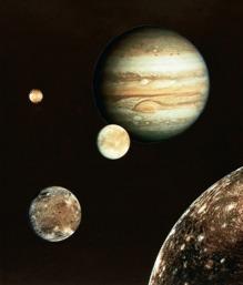 Jupiter Has more than 60 moons Four largest moons are: Io- covered by sulfur volcanoes Europa - has sea of liquid water beneath an icy surface Ganymede - planet-sized body