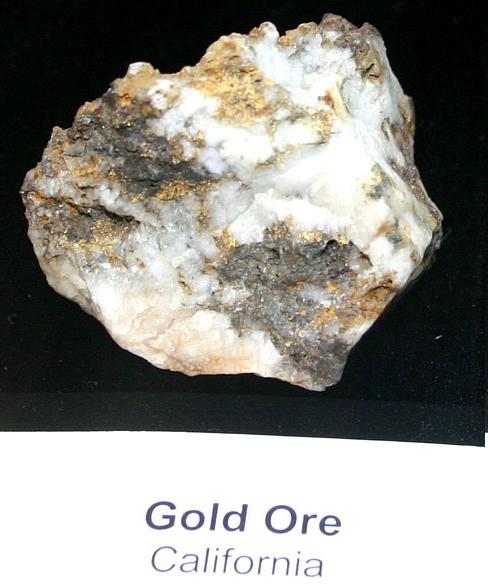 Types of Gold Deposits Small bits of gold are scattered through this piece of mesothermal vein quartz from the mother lode region of California.