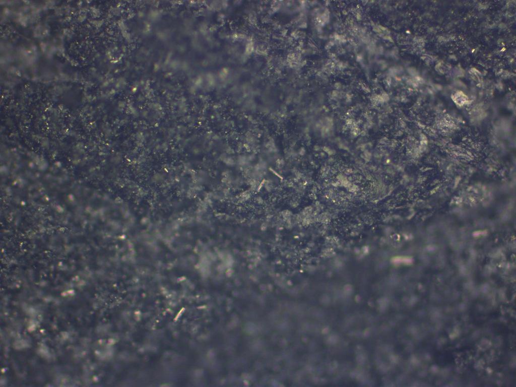 contamination centre. Figure 15 ~ Frekote Contaminant 20x Zoom In the Frekote image, figure 15 blurred patches can be seen.