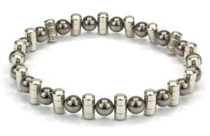 Page 18 o 0 QUESTION 18 A bracelet is made by using 10 spheres and 10 cylinders. The radii, r, o the spheres and the cylinders are exactly the same. The height o each cylinder is h.