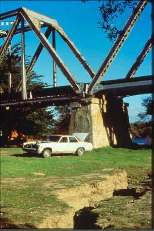 Lateral Spreading, Loma Prieta, 1989 Instructional Material Complementing FEMA 451, Design Examples Geotechnical 15-4 - 61 Site where bridge pier was shifted due to lateral spreading during the 1989