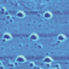 This was accomplished by varying the size and shape of the nanoparticles. Double layer periodic particle arrays.