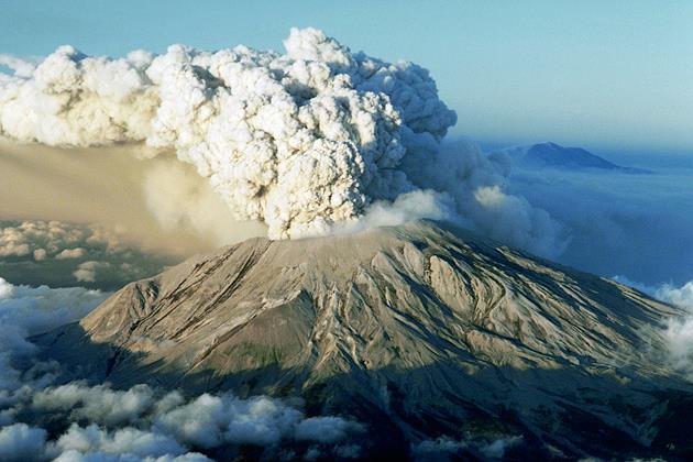 a mountainous vent in the earth s crust through which lava, gases, and