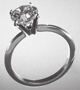 2 Answer all questions in the spaces provided. 1 The picture shows a diamond ring. Diamond Gold ring 1 (a) Diamond is a form of carbon. A carbon atom has six electrons.