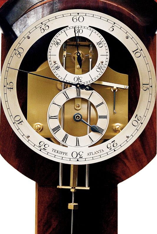 grandfather case. On a wall clock the cord is compounded with a pulley, and a tenpound weight falls about 24 inches in a month.