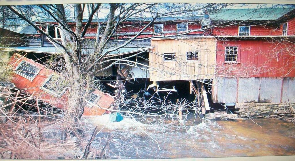 Residents of Old Mystic try to stop floodwaters