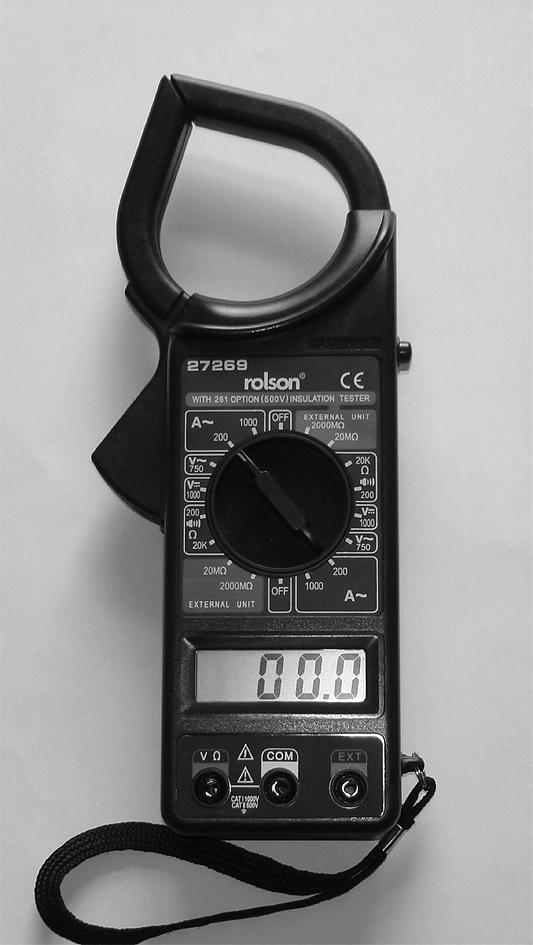 16 The photograph shows a digital clamp meter or amp-clamp. This can be used to measure the current in the live wire coming from the mains supply without breaking the circuit.