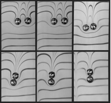 Spheres in Non-Newtonian Fluids (Above) Spheres falling in 2% polyox in 98% water draft, kiss and chain.