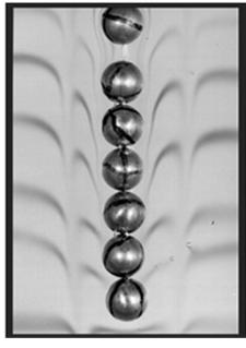 Chained spheres are a long body which is stable with its long axis vertical.