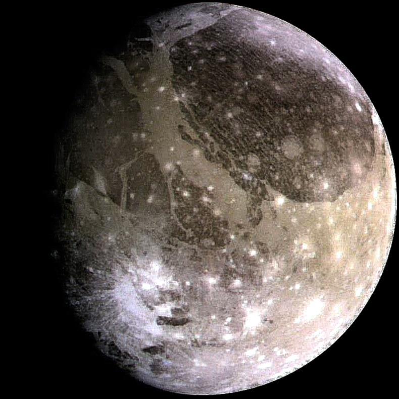 Ganymede Side facing away from Jupiter Tidally locked like Io and Europa, but appears not to have internal heating. 7.1 day orbital period and mean surface temperature 110 K.