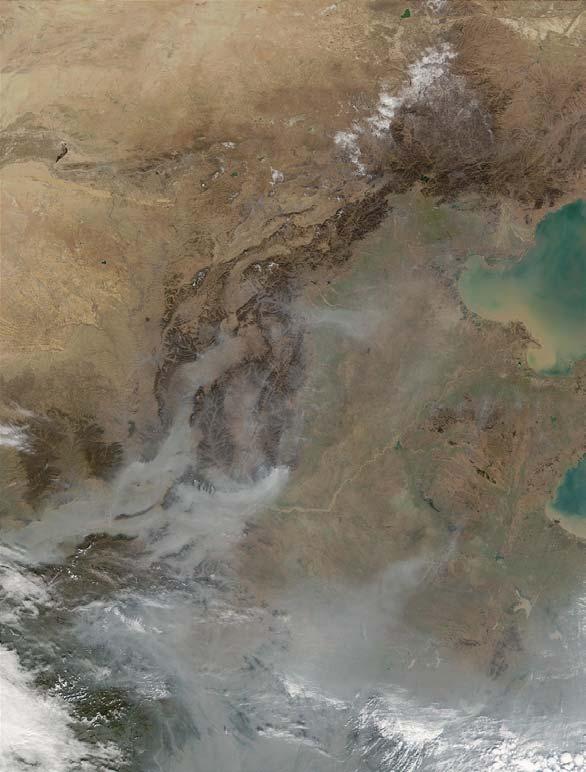 4.1 MODIS Potential Applications in China Description: A thick haze of aerosols coves eastern China in this true-color MODIS image from November 9, 2001.