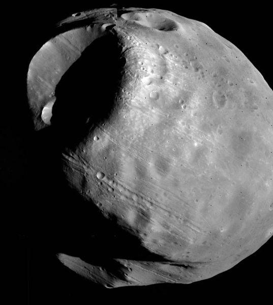 Orbital Motion Phobos is one of two small moons that orbit Mars. Phobos is a very small moon, and has correspondingly small gravity it varies, but a typical value is about 6 mm/s 2.