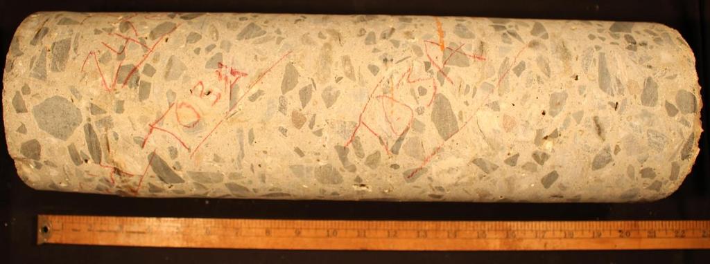 10 3.3 160159-13 (T03A) The as-received core from location T03A is shown in Figures 7 and 8. The core was 15.5 inches (39.4 cm) long and approximately 6 inches (15.24 cm) in diameter.