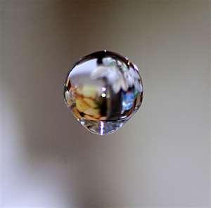 Atoms (cont) The smallness of an atom 1 drop of water contains