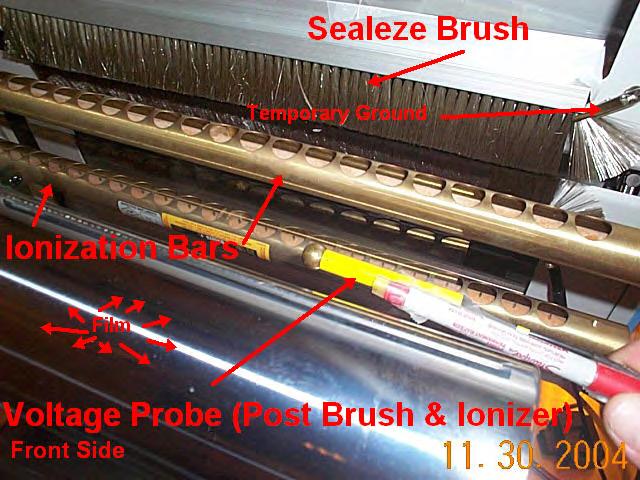 A better illustration of the Sealeze brush placement ahead of the brass colored ionization bars are found in Figures 23 and 24.