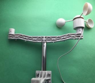 Step 13: Take the anemometer (J) and place it on the