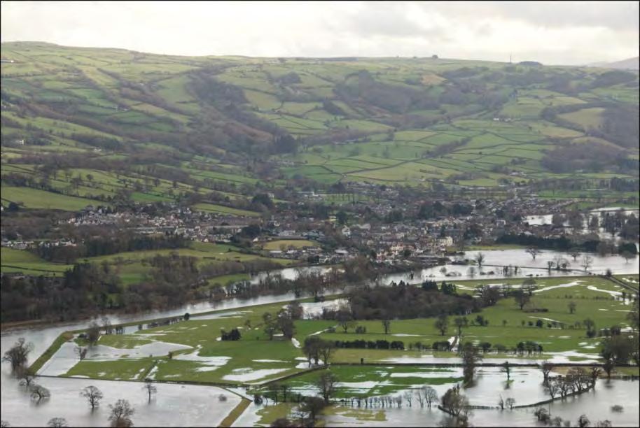 GCSE GEOGRAPHY A Sample Assessment Materials 13 Photograph 1.9 The town of Llanrwst in the flooded Conwy Valley (i) Use Diagram 1.8.