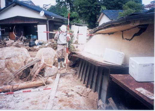 Photo 2. Damaged house in Dazaifu the house damage range ). measures such as warning and evacuation systems.