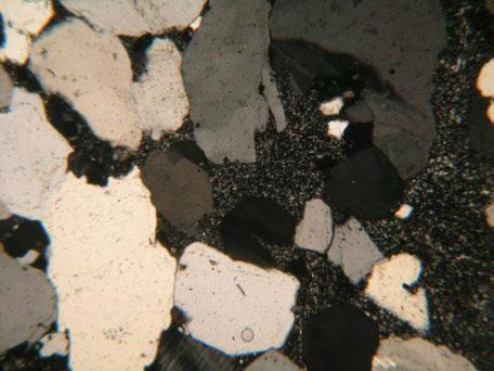 5 mm Description Rock name: silicified rock The rock consists of almost quartz, which forming aggregate of