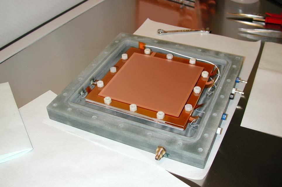 Prototype construction: detector assembling Detectors are assembled in a class 100 laminar flow bench. GEMs are stacked in a gas-tight G10 box above the pads.
