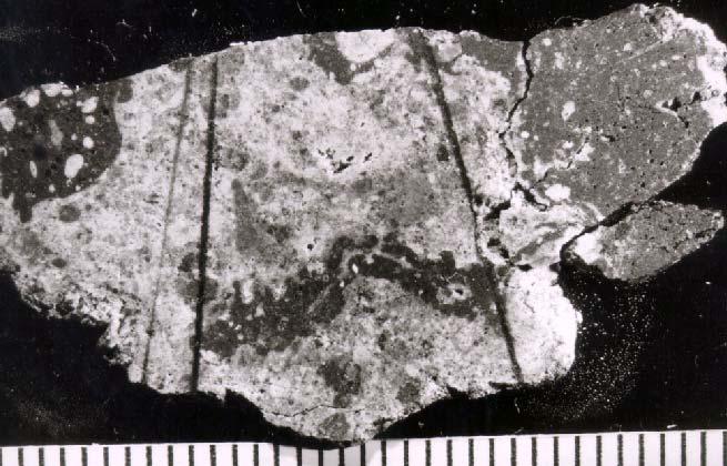 Figure 3: Photo of 12013 slab,9. Scale in mm. NASA# S70-40833 This thin slab was used to make thin sections,13,14,15.