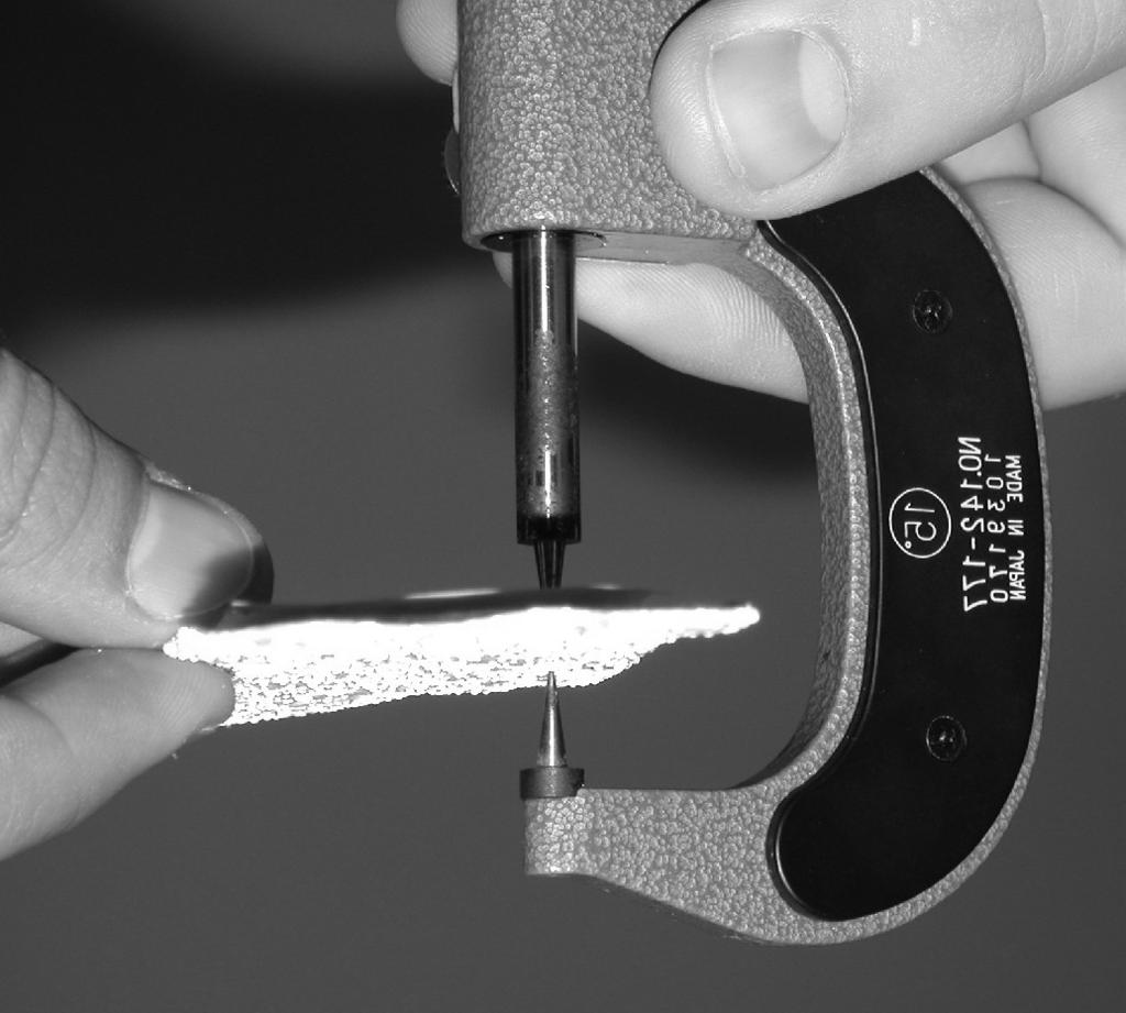 Figure 1. Typical Needlepoint Micrometer. Figure 2. Standard Laboratory Caliper.