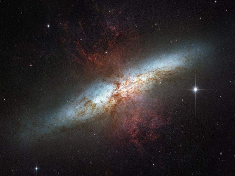 Observatory) M 82 interacting with group of galaxies Over hundreds of millions of years At least 1 major interaction with larger spiral M 81 Tidal forces => Active starburst