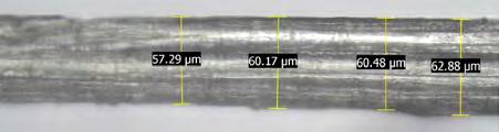 4mm) suitable for tensile testing was prepared with varying gage lengths as shown in Figure 3.