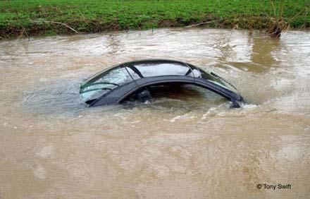 AU.K.woman sent her Mercedes flying into a river, trusting the car's optimistic GPS guidance instead of the road signs warning of impending doom.