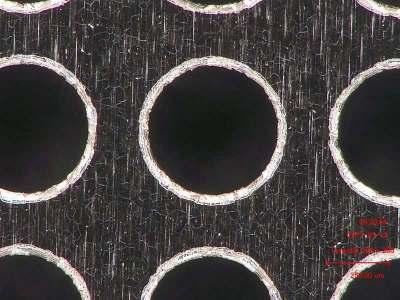 15 mm 500 µm Fig. 3. Left: three different sizes of grids (size 3, 4, 5) etched in a 50 µm thick Invar foil.