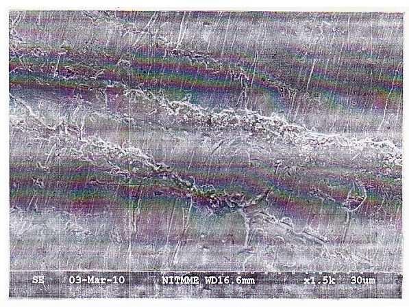 Figure 5 SEM image of surface of mild steel after immersion for 2 h in 1M HCl in presence of 0.01M CPMA CONCLUSION 1.