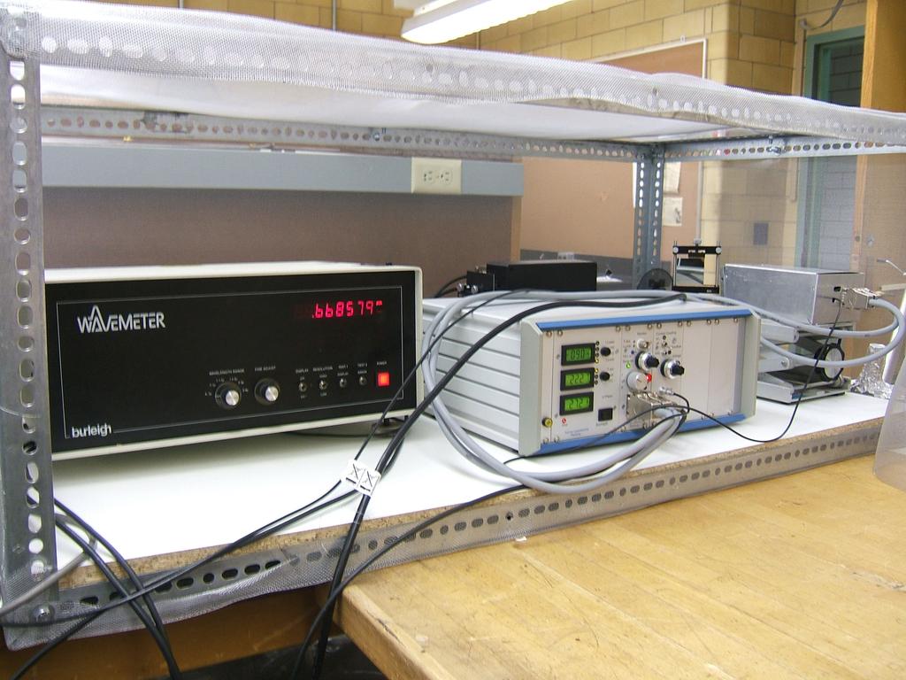 An emissive probe consisting of a biased, heated filament is used to determine the spatial variation of the plasma potential along the axis of the experiment.