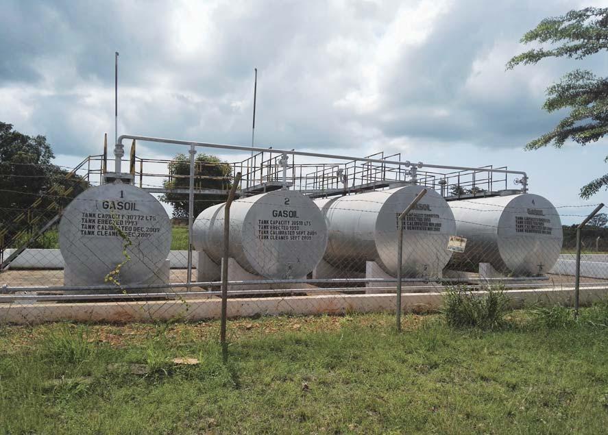 Tanga Cement oil tanks. The factory uses fuel for electricity generation. 9 (Director of Regulatory Economics), Mr. Edwin Kidiffu (Acting Director of Legal Services), Eng.