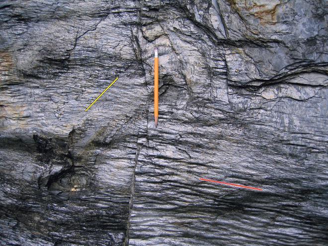 Both form cleavagecleavage intersection lineations on the early cleavage surface. Charlemont, Massachusetts, USA. Figure 15.16 Folded phyllite at greenschist facies.