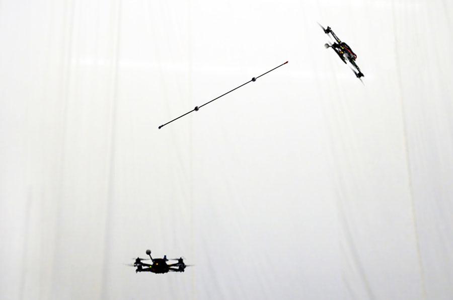 Quadrocopter Pole Acrobatics Dario Brescianini, Markus Hehn, and Raffaello D Andrea Abstract We present the design of a system that allows quadrocopters to balance an inverted pendulum, throw it into