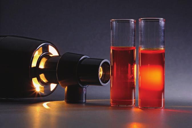 560 chapter 13 Properties of Solutions Figure 13.25 Tyndall effect in the laboratory. The glass on the right contains a colloidal dispersion; that on the left contains a solution.