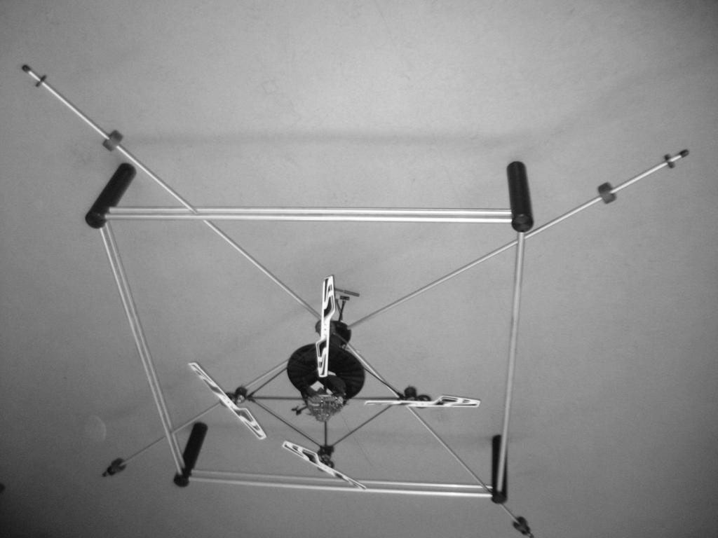 Fig. 1. A quadrotor in an experimental testbed.