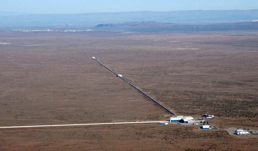 LIGO is two identical interferometers thousands of miles apart using beam splitters to detect the