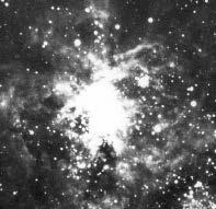 The Large Cloud contains many clusters of young luminous stars seen as patches of light in binoculars and telescopes. The Large Cloud is about 160 000 light years away, the Small Cloud 200 000 l.