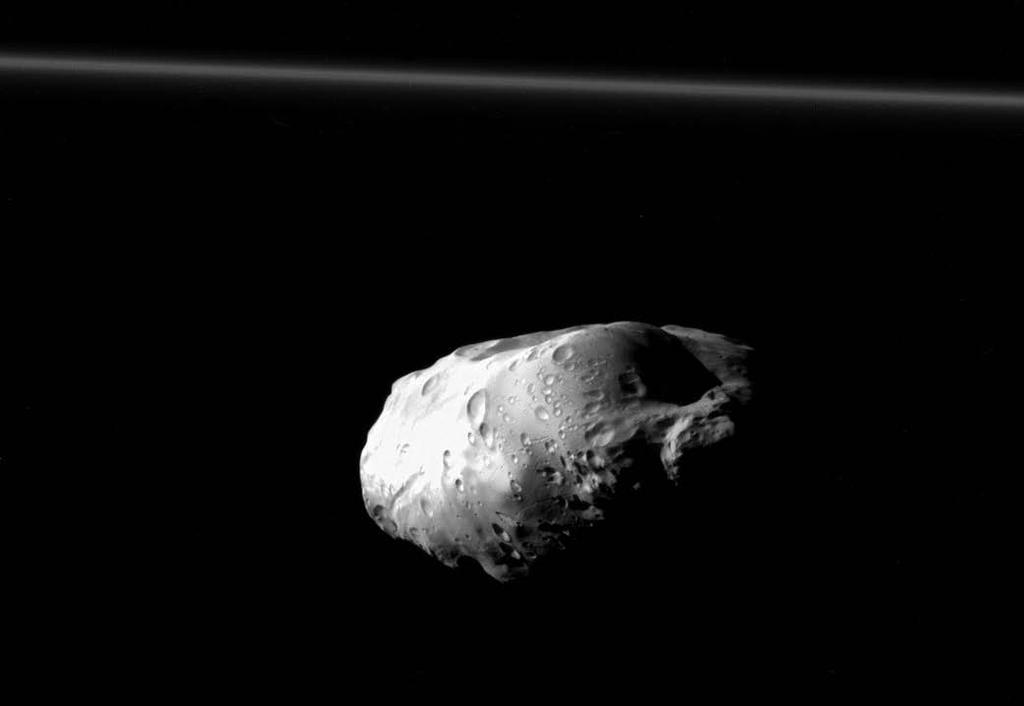 Prometheus (63 miles across) and Saturn