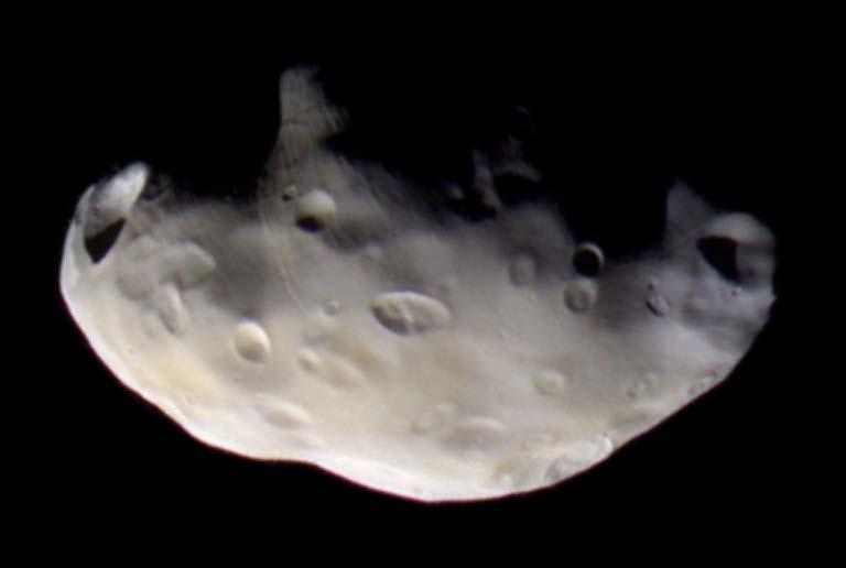 Pandora, shepherd moon orbiting just outside Saturn s F ring.