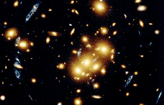 the total mass of the cluster.