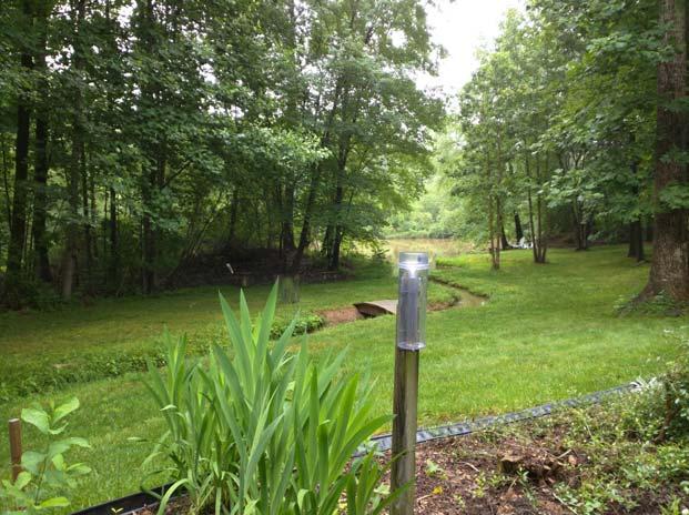 Page 8 of 10 Ed's backyard where he monitors rainfall and local conditions. Photo submitted by Ed Barrows.