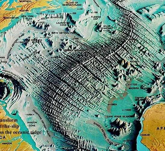 OCEAN BASIN RIDGES & RISES UNDERWATER MOUNTAIN RANGES FORMED BY SEA-FLOOR SPREADING CONTAIN CENTRAL RIFT