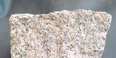 Granite is a coarse-grained igneous rock composed mostly of light-colored, light-density, nonferromagnesian minerals.