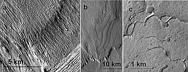 Shows aeolian erosion features (yardangs), layering and